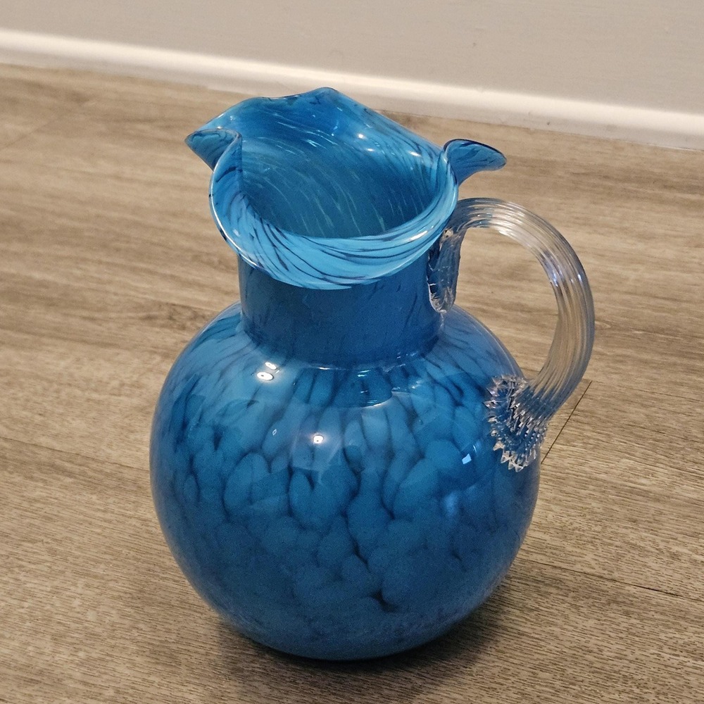 art glass pitcher blue and white swirl splatter design clear handle